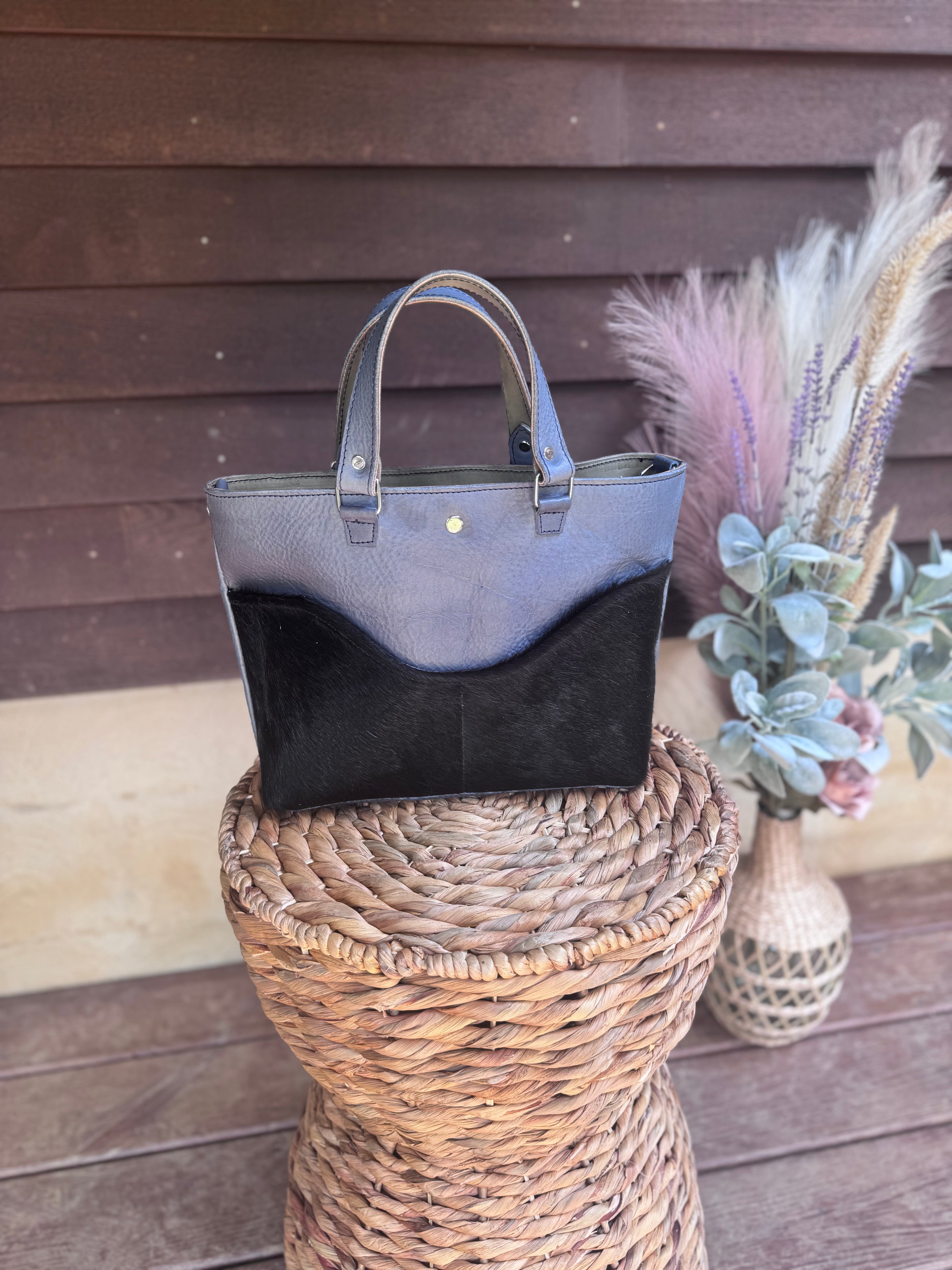 Full grain leather hair on daisy denim/ navy
